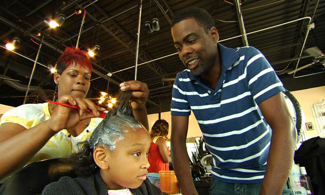 Feel the Burn: Chris Rock Observes a Hair Straightening Demonstration in ‘Good Hair’