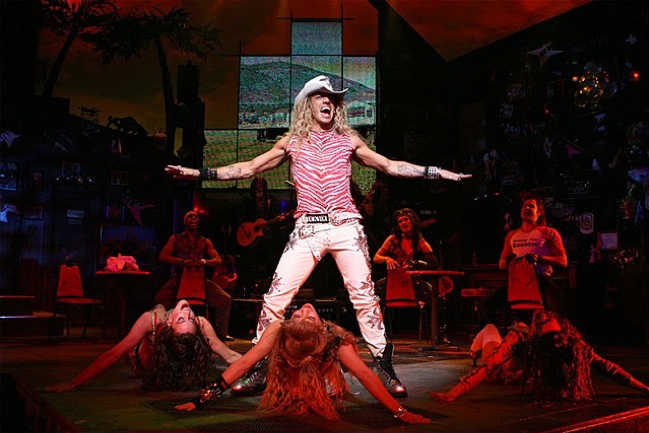 ”Rock of Ages” plays the Bank of America Theatre in Chicago.” target=
