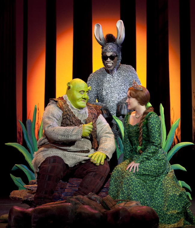 Eric Petersen, Alan Mingo, and Haven Burton star in “Shrek the Musical”.” target=