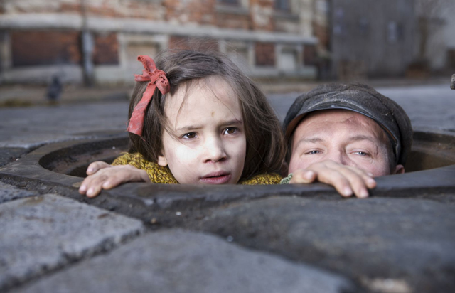 The Light Above: Milla Bankowicz (Krystyna) and Robert Wieckiewicz (Leopold) for “In Darkness’