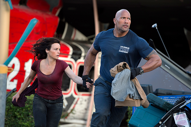 Carla Gugino and Dwayne Johnson in San Andreas