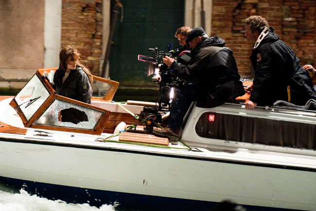 Angelina Jolie with crew and director Florian Henckel von Donnersmarck (right) on the set of The Tourist in Venice, Italy